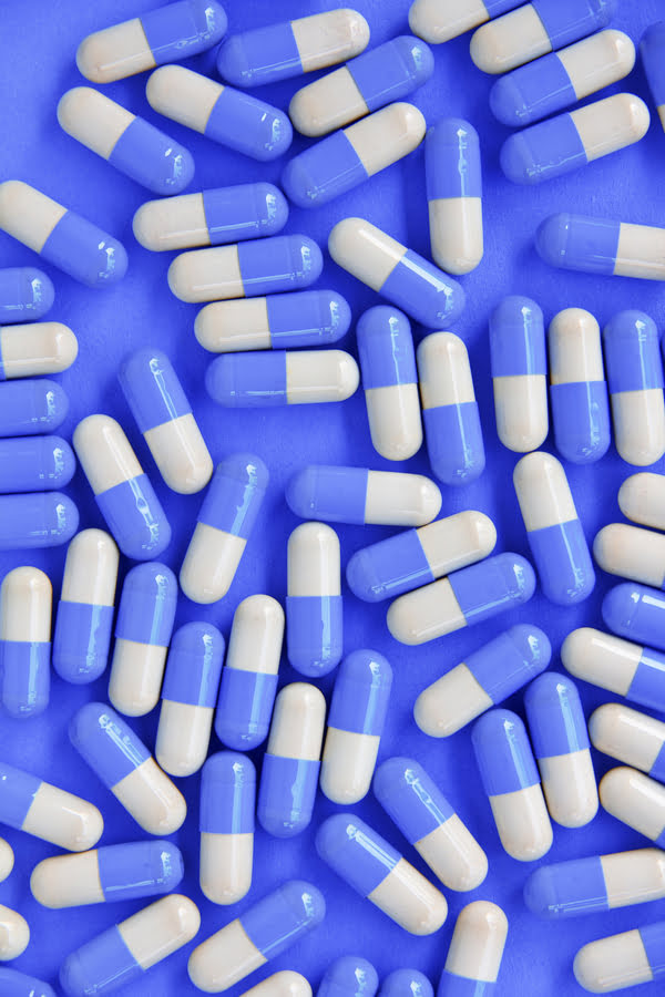 capsules-fond-bleu